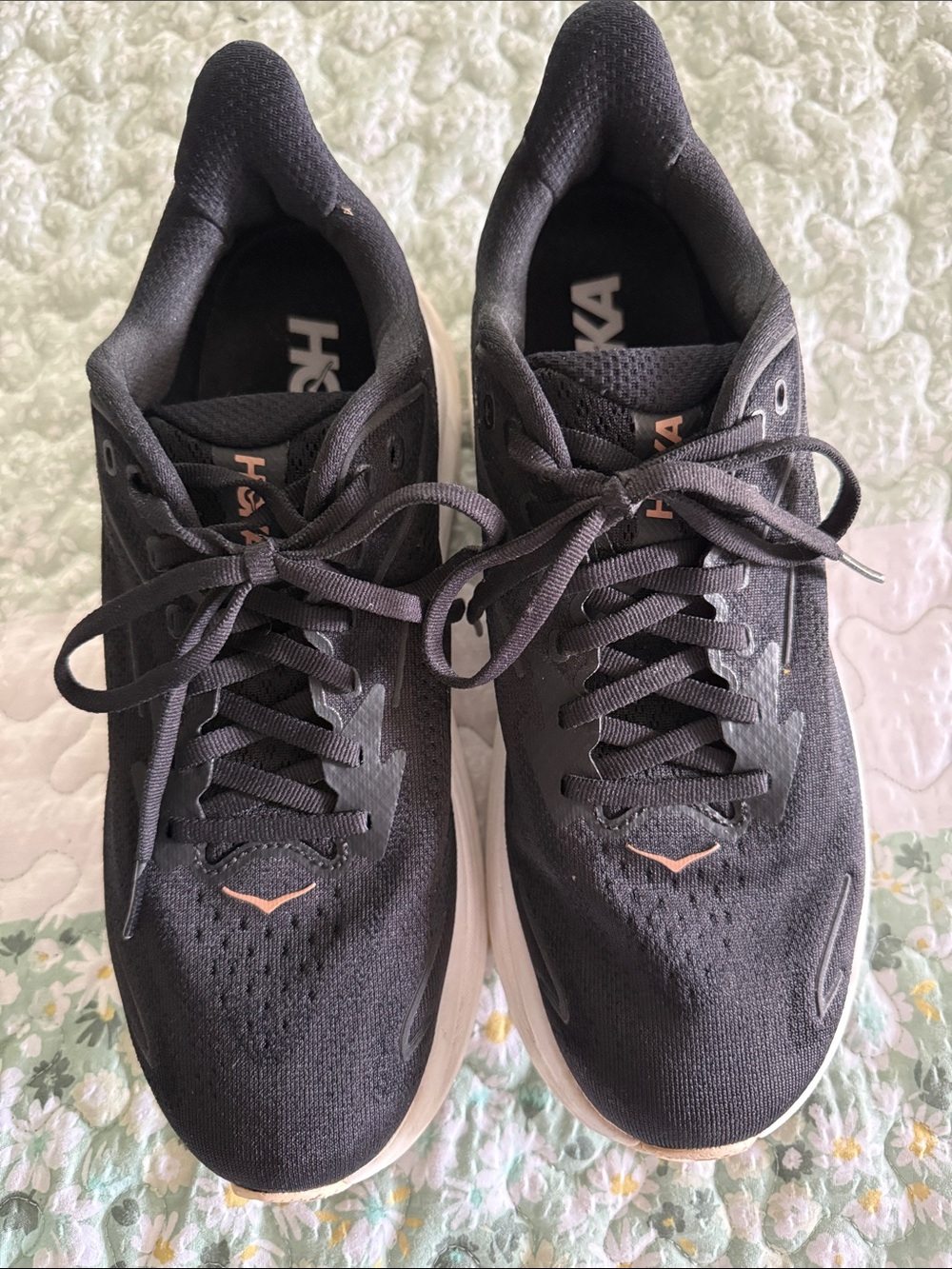 Hoka Women’s Black Athletic Shoes with Subtle Rose Gold Accent